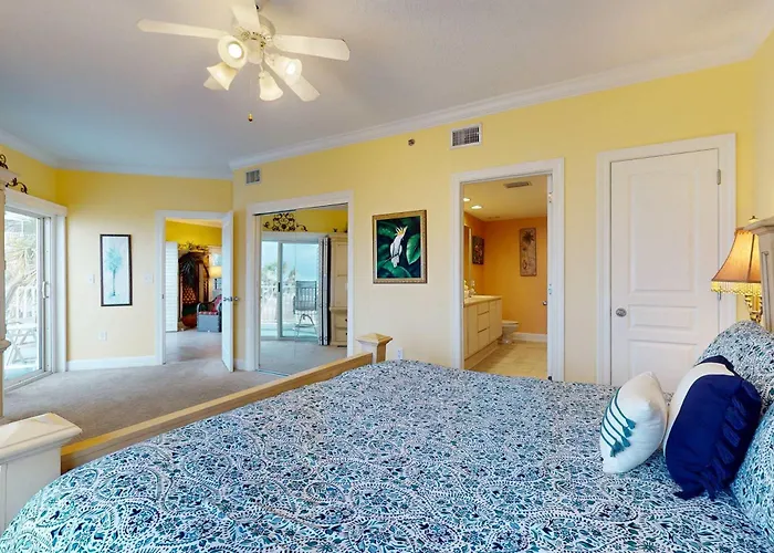 Waterfront With Expansive Corner Balcony Grill Area & Multiple Shared Pools