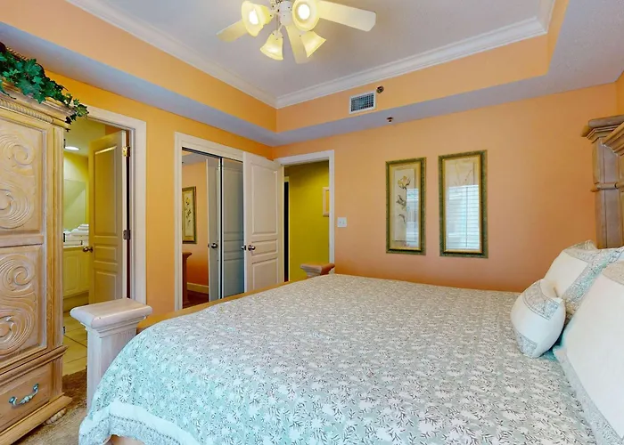 Waterfront With Expansive Corner Balcony Grill Area & Multiple Shared Pools