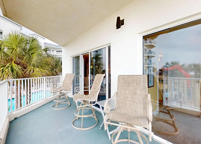 Waterfront With Expansive Corner Balcony Grill Area & Multiple Shared Pools